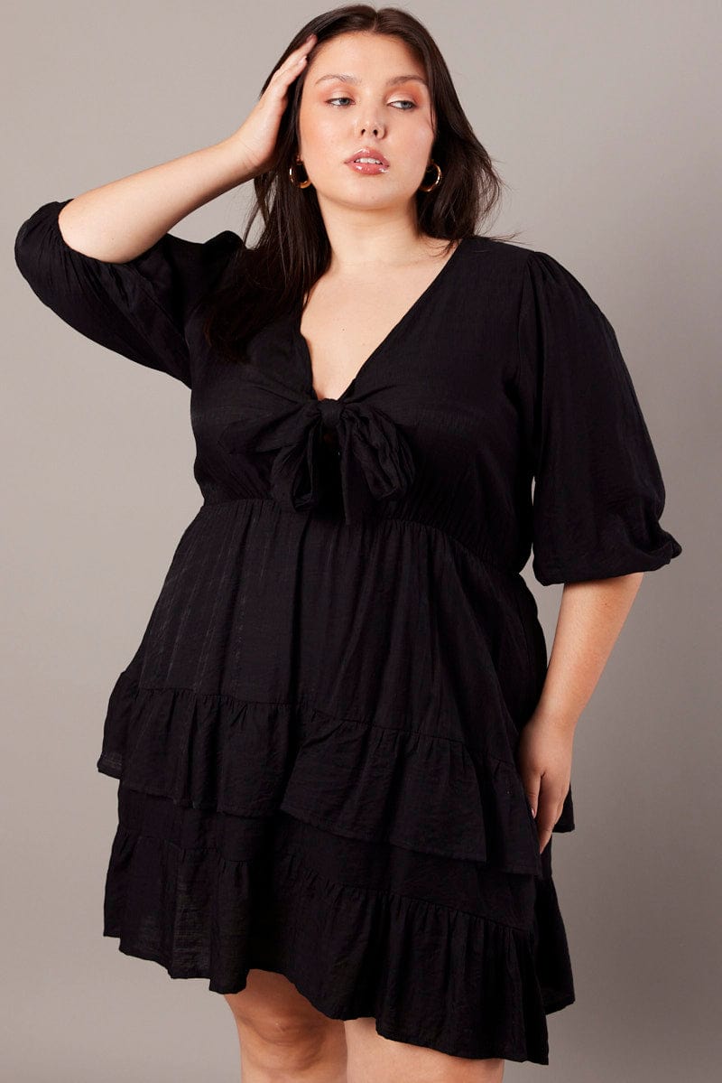 Black 3/4 Sleeve Tie Frill Mini Dress | You & All Black 3/4 Sleeve Tie Frill Mini Dress | You & All
