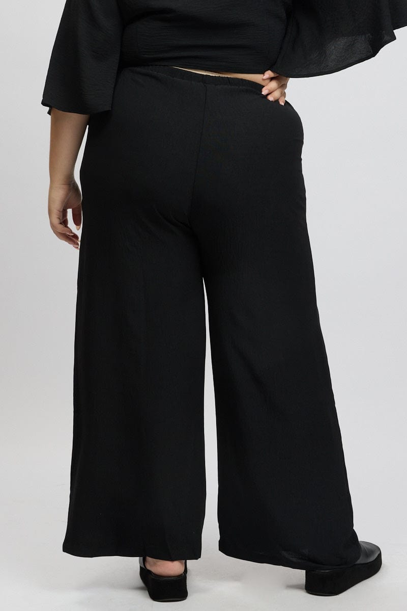 Black Textured Georgette Lined Wide Leg Pants for YouandAll Fashion