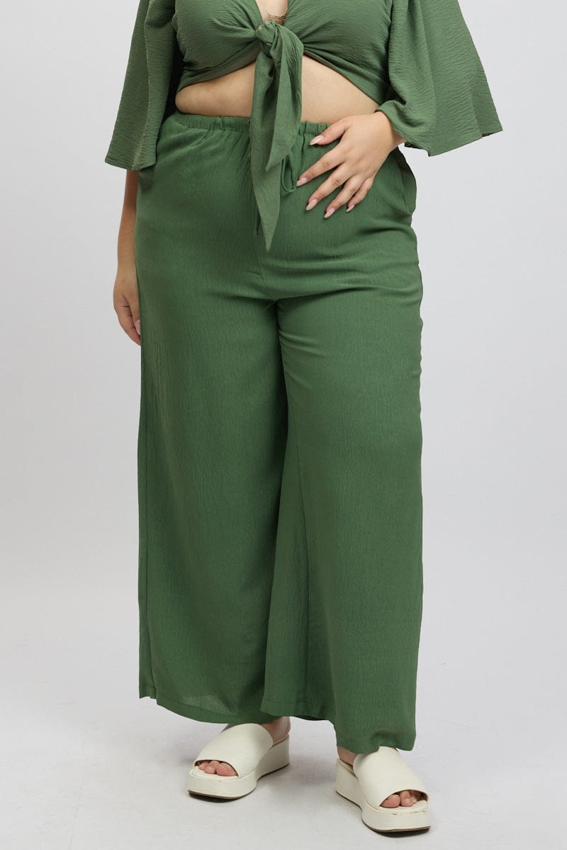 Green Textured Georgette Lined Wide Leg Pants for YouandAll Fashion