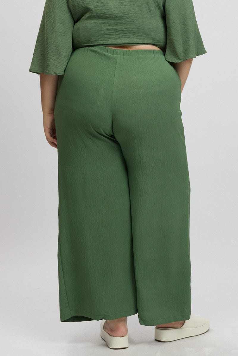 Green Textured Georgette Lined Wide Leg Pants for YouandAll Fashion