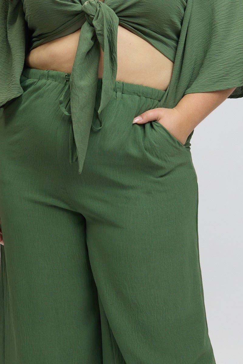 Green Textured Georgette Lined Wide Leg Pants for YouandAll Fashion