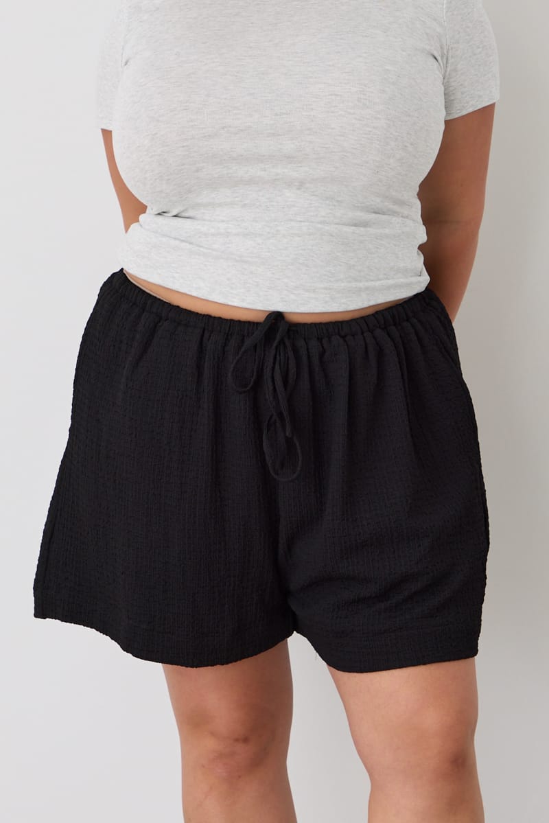 Black Mid Rise Textured Shorts for YouandAll Fashion