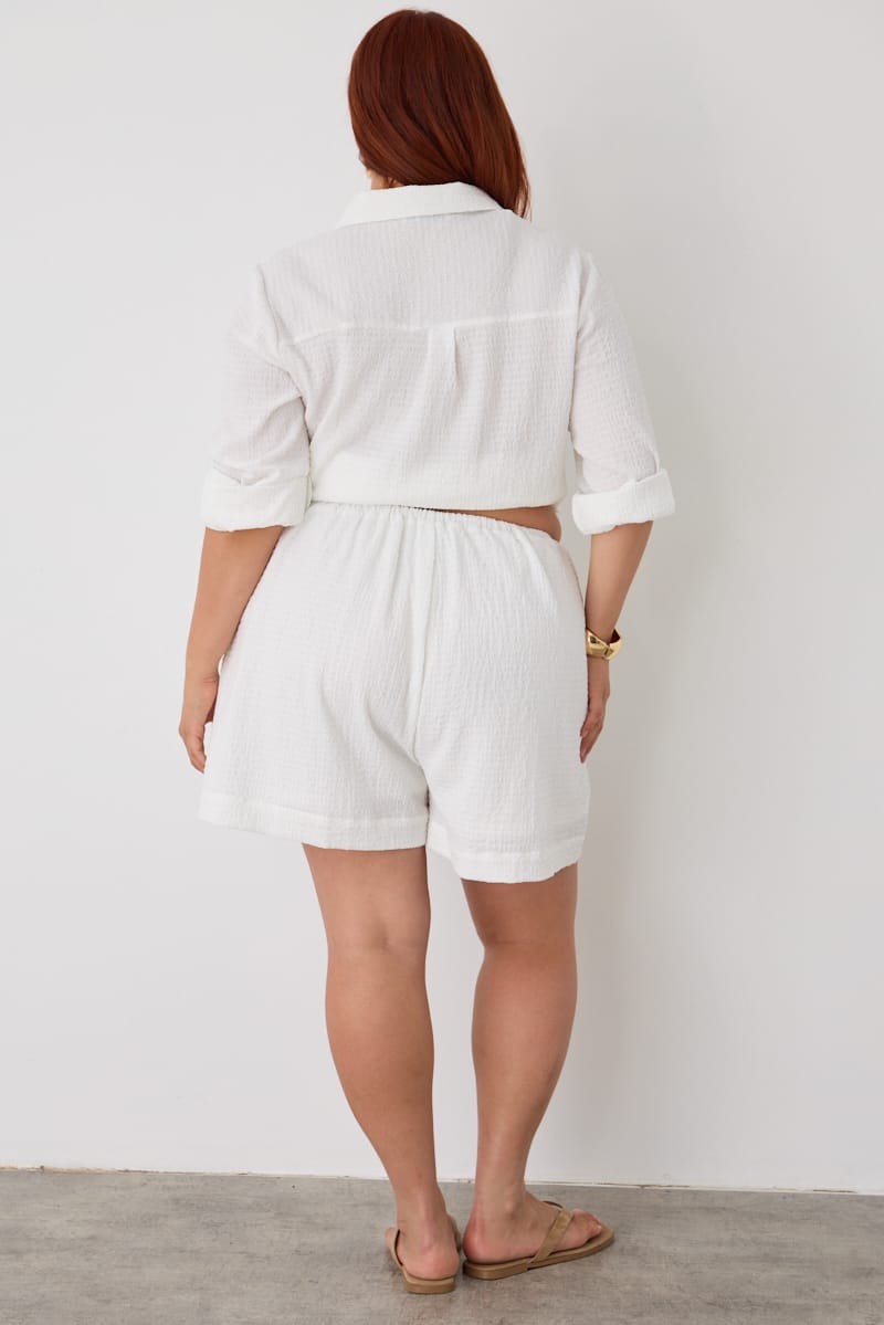 White Mid Rise Textured Shorts for YouandAll Fashion