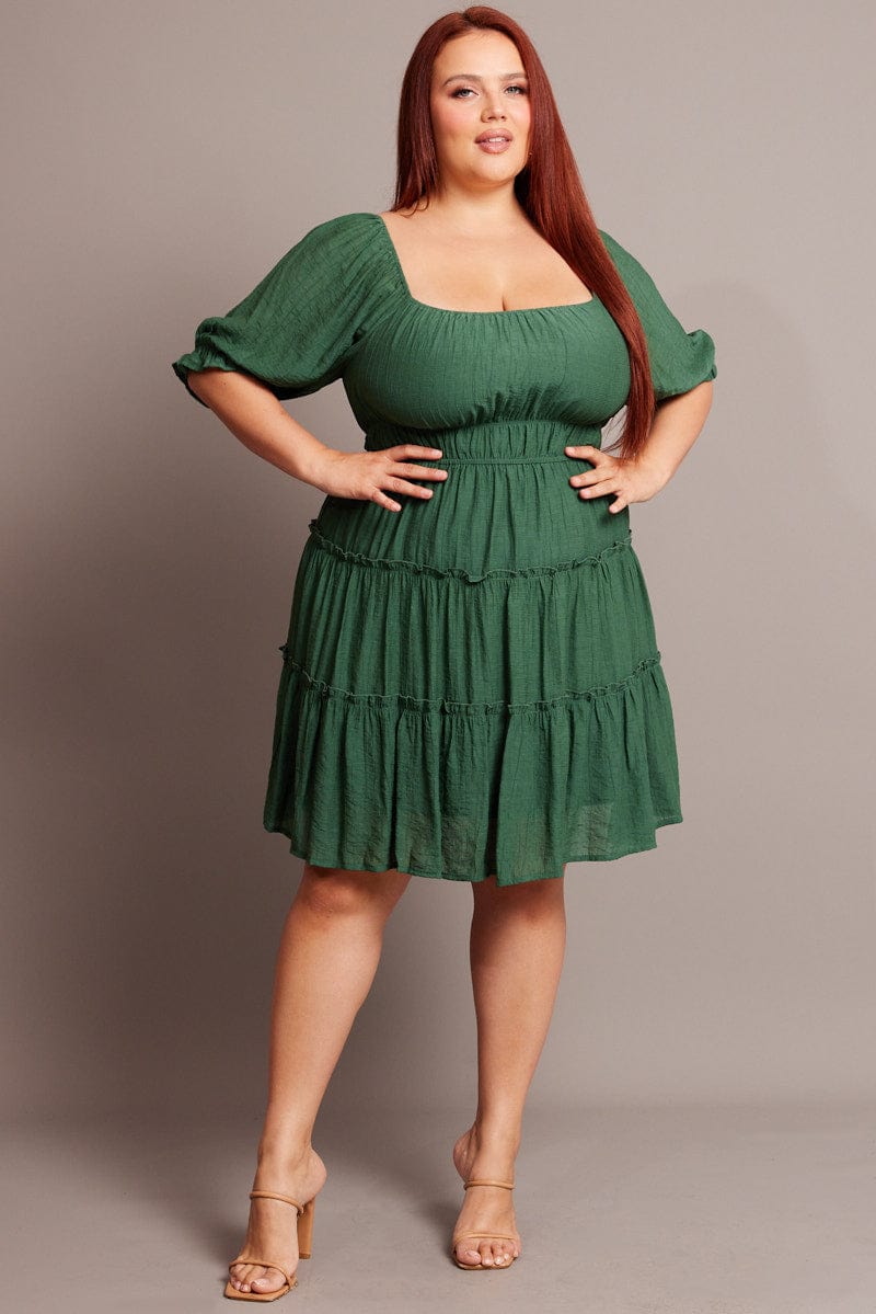 Green Mini Dress With Elastic Waist And Frill Skirt | You & All Green Mini Dress With Elastic Waist And Frill Skirt | You & All