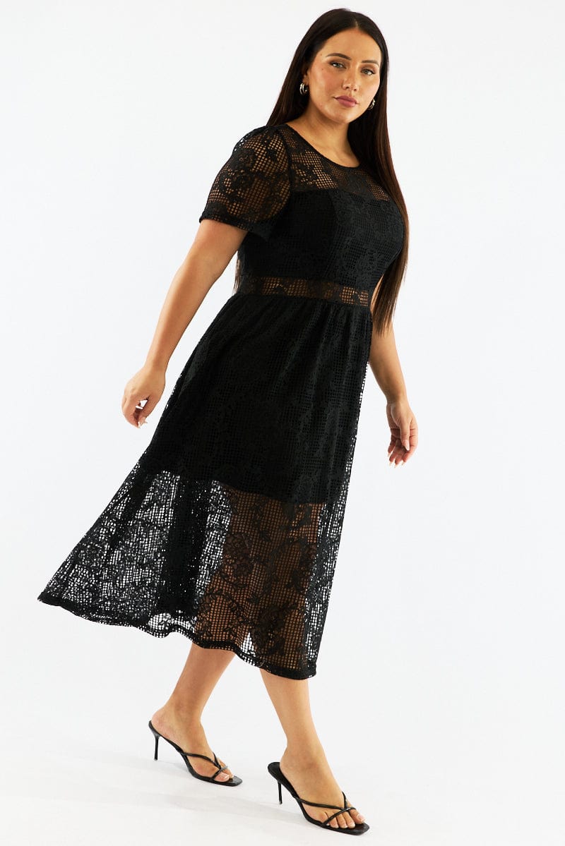 asos midi dress with short sleeves ASOS DESIGN short sleeve midi dress with ruched tie side detail in black